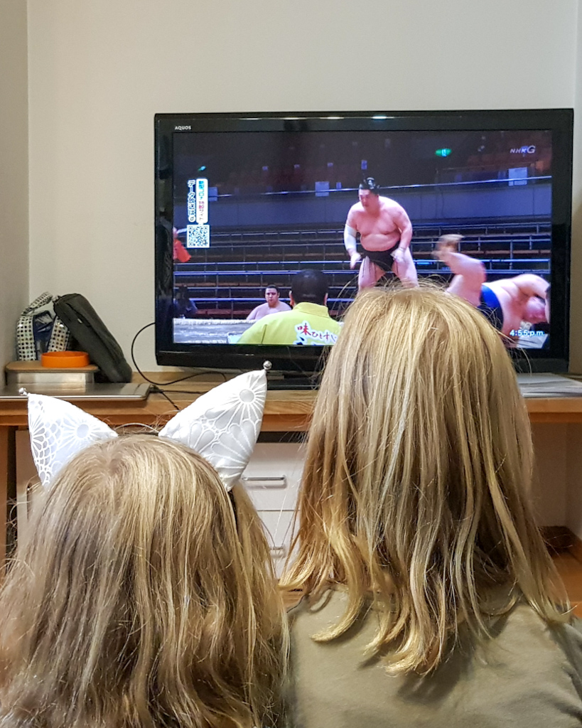 Our two kids watchin sumo Basho in Japan